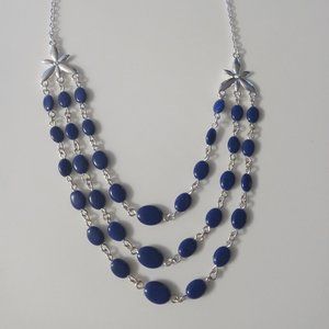 Signed blue and silver tone necklace